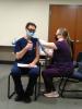 RN Rob Wells gets his second COVID-19 shot from LPN Mary Edson 01-12-21 Submitted photo